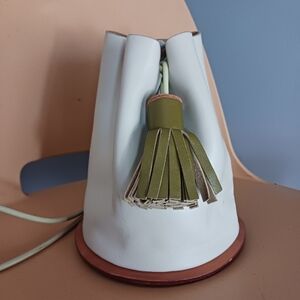 Elegant White Crossbody Bag with Olive Tassel